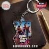 Grand Theft Auto VI Vice City custom shape keychain featuring Lucia and Jason on a metal ring against a notebook background.