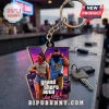 Grand Theft Auto VI Vice City keychain featuring a Roman numeral VI logo with game characters on a metal ring.