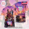 Grand Theft Auto VI Vice City Sunset Shirt featuring vibrant purple and orange tropical skyline graphics and game characters.