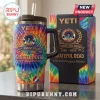Grateful Dead 1965-2026 Anniversary YETI Tumbler Cup with tie-dye pattern, skull logo, and electric guitar graphic.