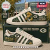 Green Bay Packers Heritage Mascot casual shoes featuring team colors, mascot graphic, and Lambeau Field imagery.