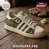 Green Bay Packers Heritage Mascot Casual Shoes featuring dark green panels, team logos, and text on a cream canvas base.