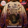 Hocus Pocus Sanderson Sisters purple ombre ugly sweater featuring a spellbook, black cat, and autumn leaves on cream fabric.