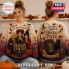 Hocus Pocus Sanderson Sisters purple ombre ugly sweater featuring character illustrations, pumpkins, and autumn leaf graphics.