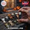 Horror Movie Character 2026 Halloween Advent Calendar featuring miniature chibi-style slasher keychains on a wooden table.