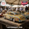 Hot Wheels John Lennon 85th Anniversary Rolls-Royce Car featuring vibrant psychedelic floral patterns and peace signs.