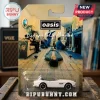 Hot Wheels Oasis Definitely Maybe BMW 507 White Diecast Car inside a collectible blister pack featuring the album cover art.