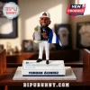 Houston Astros Yordan Alvarez resin bobblehead figure wearing a white cap and holding a World Series trophy on a plinth.