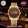 Indian Motorcycle 125th Anniversary Watch featuring a gold band, textured brown dial, and commemorative 1901-2026 branding.