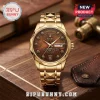 Indian Motorcycle 125th Anniversary Watch featuring a gold-tone band, textured brown dial, and motorcycle emblem details.