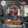 Indiana Fever Coach and Player Christmas Ornament featuring a fist-bumping coach and athlete on a team logo base.