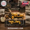 Indianapolis 500 Marmon Wasp No. 32 diecast car toy on branded packaging featuring a yellow vintage racer graphic.
