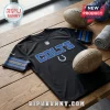 Indianapolis Colts Rivalries Black Performance Shirt featuring blue Colts text and logo on a wooden table with footballs.