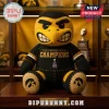 Iowa Hawkeyes Heroes Game Champions plush toy in black and gold with a mascot face, trophy graphic, and stitched details.