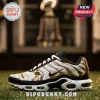 Iowa Hawkeyes Mascot Air Max Plus Sport Shoes featuring gold, black, and white mesh upper on a turf grass background.
