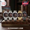 Iron Maiden Eddie Premium Quartz Watch collection in silver, gold, and black metal finishes displayed on a wooden stand.