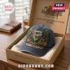Jimmy Buffett Premium Charcoal Baseball Cap featuring tropical embroidery including a guitar, parrot, and margarita glass.