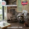 Jimothy The Raccoon Seattle Vinyl Figure standing next to its branded display box on a wooden desk with a wildlife book.