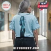 Karol G Album Signature Light Blue Baseball Jersey worn by a woman, featuring a photo print, barbed wire, and signature.