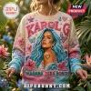 Karol G Mañana Sera Bonito Ugly Sweater featuring blue hair portrait, floral embroidery, and hearts on a beige background.