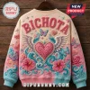 Karol G Mañana Sera Bonito Ugly Sweater featuring embroidered pink heart, wings, butterflies, and the text Bichota.