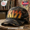 KISS Band Golden Logo Camo Baseball Cap featuring a gradient yellow and orange logo on a dark grey camouflage pattern.