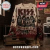 KISS Rock and Roll All Nite Ugly Sweater in beige and maroon featuring band members, red flames, and metallic studs.