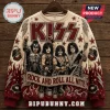 KISS Rock and Roll All Nite ugly sweater in beige featuring the band members, red flames, lightning bolts, and metallic studs.