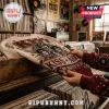 KISS Rock and Roll All Nite ugly sweater featuring red sequins, band member portraits, and metallic embroidery in a shop.