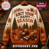 Knit Your Happy Season Autumn Cable Knit Sweater features embroidery of pine trees, yarn baskets, and falling leaves.
