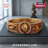 Lion Strength Horoscope Engraved Bracelet featuring a gold lion emblem, deep red enamel accents, and crystalline details.