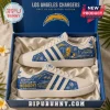 Los Angeles Chargers Adidas Lace Casual Sneakers in a blue box featuring team colors, bolt logo, and graphic illustrations.