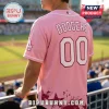 Los Angeles Dodgers x Breast Health Awareness pink baseball jersey with Dodgers text and number 00 on the back.