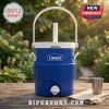 Lowe's Portable Blue Mini Cooler Jug with white handle and spout centered on a wooden table in an outdoor garden setting.