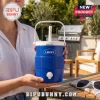 Lowe's Portable Blue Mini Cooler Jug with white handle and spout held by a person in an outdoor patio setting.