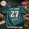 Luke Combs Philadelphia Eagles 2027 Tour football jersey in midnight green with number 27 and white signature on back.