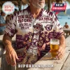 Manly-Warringah Sea Eagles Maroon Hawaiian shirt with tropical palm tree graphics and team typography on a tan background.