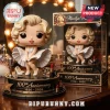 Marilyn Monroe 100th Anniversary Vinyl Figure with blonde hair, white dress, and gold base in branded collector box.