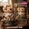 Marilyn Monroe 100th Anniversary Vinyl Figure with blonde hair and white dress on a commemorative display base with props.