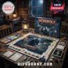 Michael Myers Collector Edition Halloween Board Game set displayed on a wooden table with a vintage lantern and game cards.