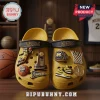 Michigan Wolverines 2026 National Champions Crocs with yellow foam, sports charms, mascot, trophy, and basketball graphics.