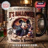 Mickey and Minnie Mouse Halloween Ceramic Mug featuring a newspaper-style print of the duo in vampire and witch costumes.