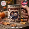 Mickey and Minnie Mouse Halloween Ceramic Mug featuring vampire Mickey and witch Minnie in a newspaper print design.