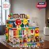 M&M's Candy Store Building Block Set featuring a two-story model with red and yellow M&M characters and interior shelving.