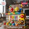 M&M's Candy Store Building Block Set featuring a multi-story retail shop, M&M character figures, and colorful brick details.