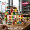 M&M's Candy Store Building Block Set featuring a two-story model store, red and yellow M&M figures, and tiny candy displays.
