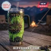 Monster Energy 24th Anniversary Edition Yeti Tumbler Cup with green tie-dye print, monster truck graphic, and clear lid.