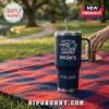 New England Patriots 1776-2026 America 250 Stanley Tumbler in dark blue with team logo and commemorative dates on a plaid rug.