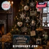 New York Yankees 24-Day Christmas Advent Calendar featuring team-themed ornaments on a tree in a cozy living room setting.