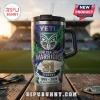 New Zealand Warriors 31st Anniversary Stanley Tumbler 40oz with team logo, blue and green graphics, on a wooden table.